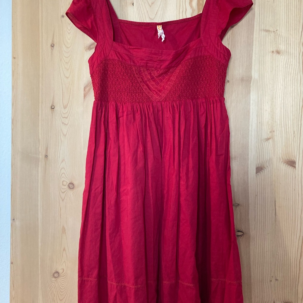 Maeve 100% cotton red dress with lots of details throughout.